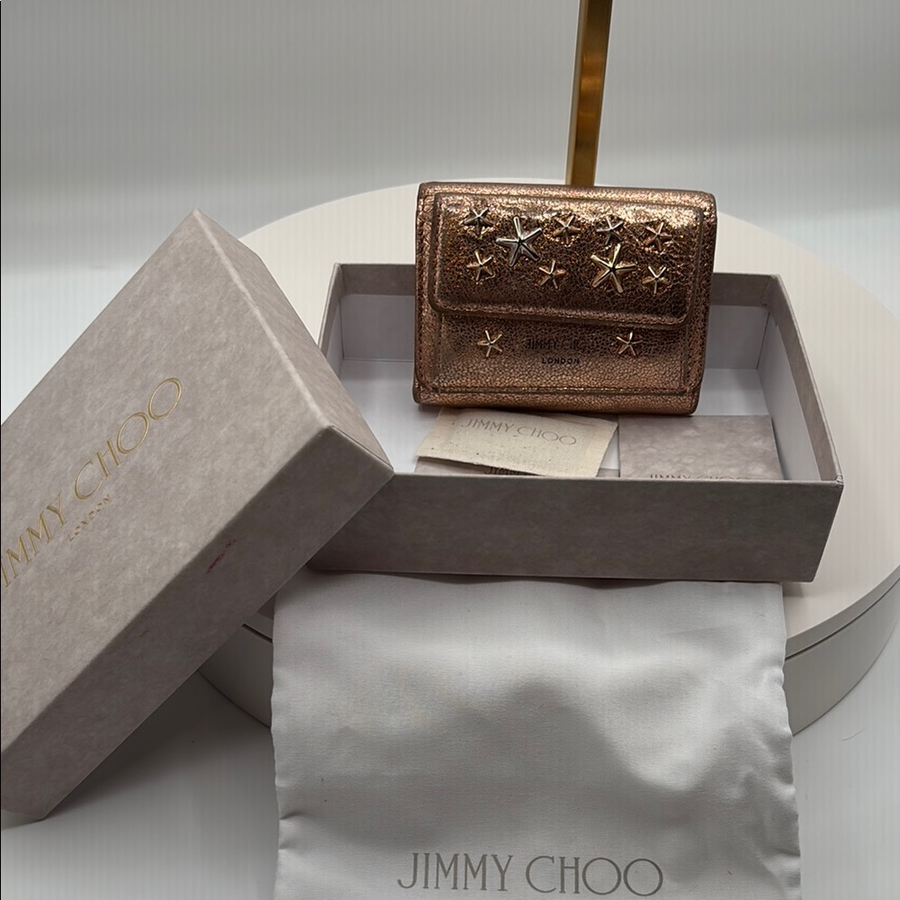 Pre-loved Jimmy Choo Gold Compact Wallet in rose gold.